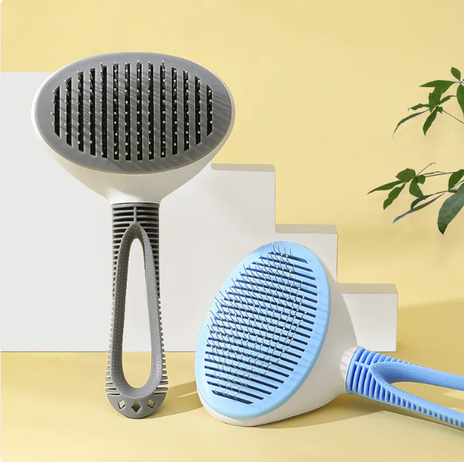Muffy blue pet hair removal comb with coarse needle teeth, 19x10cm for grooming and removing loose fur from cats and dogs.