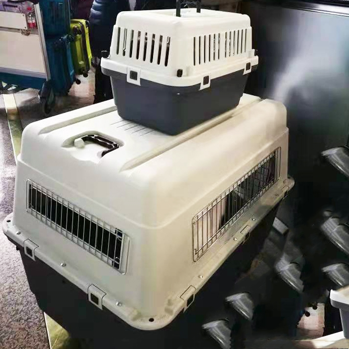 Beige, white, and grey Muffy Pet Air Travel Box with blue accents, measuring 101x68x75cm, designed for safe pet transportation.