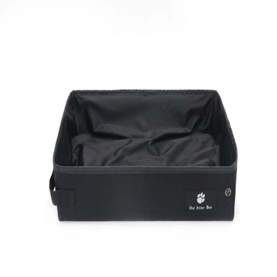 Black portable folding cat litter box by Muffy, ideal for outdoor travel, compact and easy to carry.