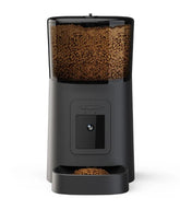 Black Muffy automatic pet feeder with built-in camera, featuring a digital display and multiple food compartments for pet feeding.