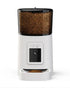 Black Muffy automatic pet feeder with camera, featuring a digital display and food tray for convenient pet feeding.