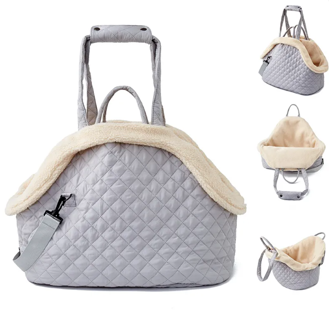 Black quilted Korean-style pet travel bag by Muffy with breathable mesh panels and secure zipper closure.