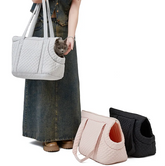 Black quilted Korean-style pet travel bag by Muffy with mesh ventilation and padded handles for comfortable transport.