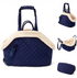 Black quilted Korean-style pet travel bag by Muffy with breathable mesh panels and sturdy handles for easy carrying.