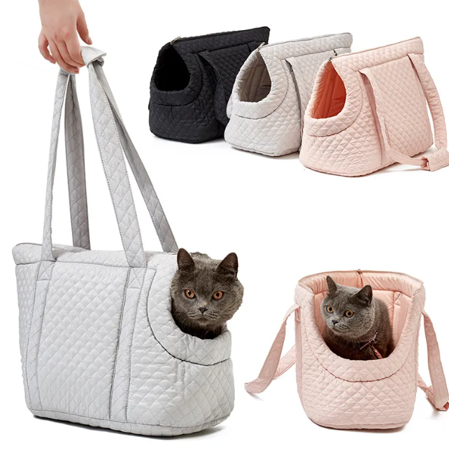 Black quilted Korean-style pet travel bag by Muffy with mesh ventilation and sturdy handles for comfortable carrying.