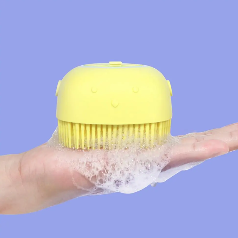 Blue Muffy dog bath massage brush for grooming and cleaning, with soft bristles for gentle pet care.
