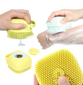 Blue Muffy dog bath massage brush with soft bristles for cleaning and grooming pets during bath time.