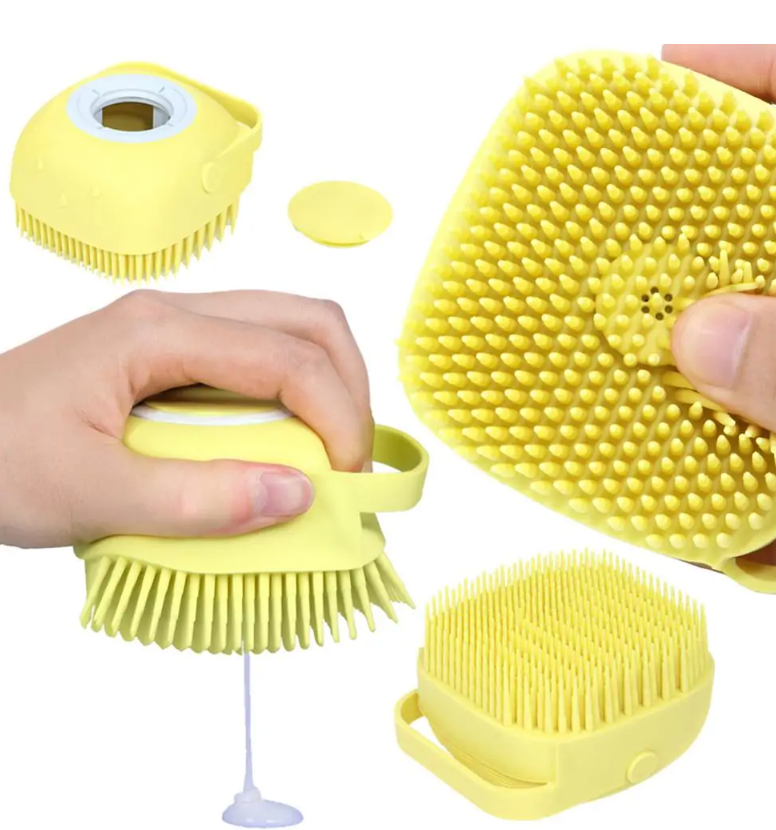 Blue Muffy dog bath massage brush with soft bristles, used for cleaning and grooming pets during baths.
