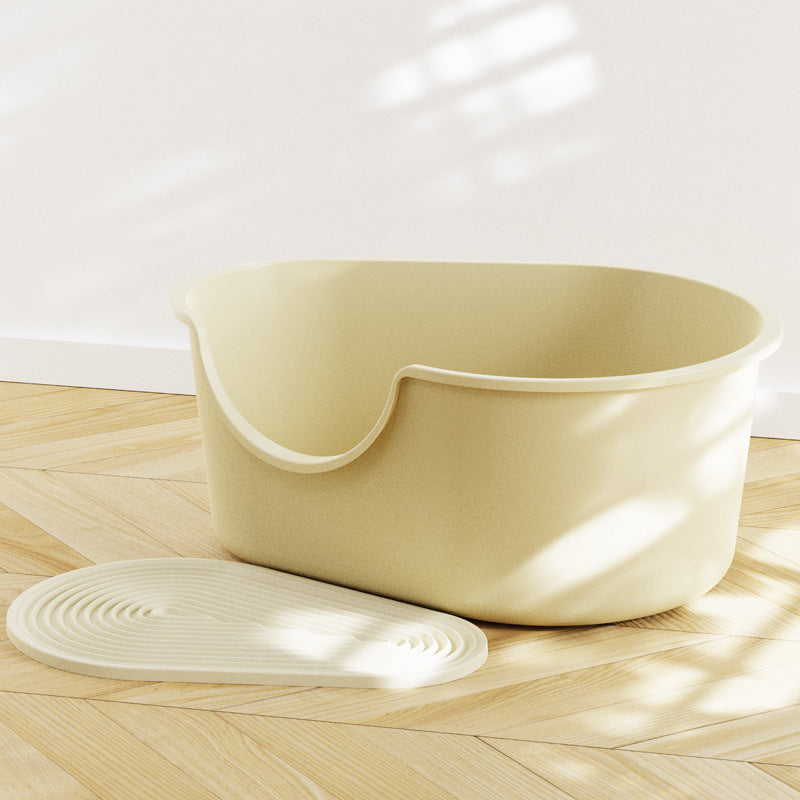 Creamy white large open cat litter box with splash guard by Muffy, featuring high sides and easy access for cats.