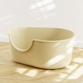 Creamy white large open cat litter box by Muffy with splash guard, 59x41.5x25cm, designed for easy cleaning and mess containment.