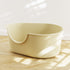Creamy white large open cat litter box by Muffy with splash guard, 59x41.5x25cm, designed for easy cleaning and mess containment.