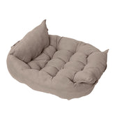 Dark green customizable Muffy multifunctional folding pet cushion with soft padding and versatile use for pets.