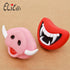 Muffy rubber squeaky dog toy shaped like a demon for dogs, designed for play and entertainment.