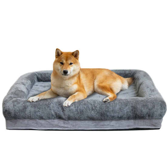 Muffy large memory foam dog bed for extra-large dogs, with four-sided cushioned edges and soft fabric for comfortable rest.