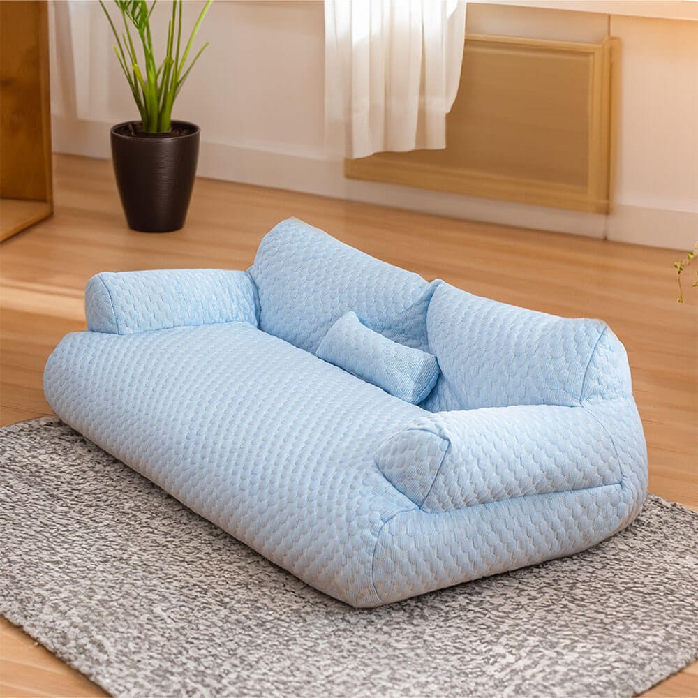 Muffy washable dog sofa bed with geometric pattern, plush cushioning, and refreshing design for comfortable pet rest.