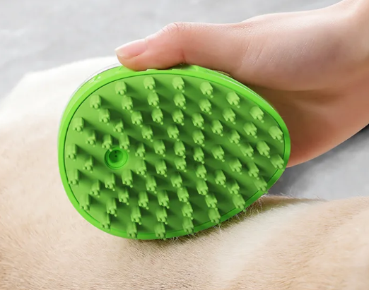 Green Muffy Pet Bath Brush for Dogs with soft bristles, ideal for gentle grooming and bathing.