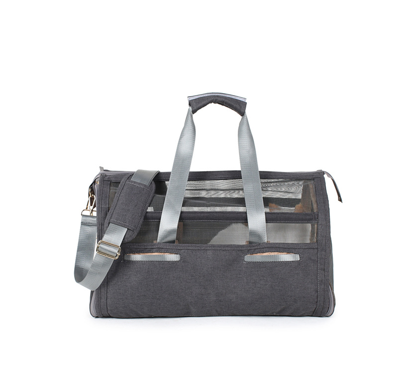 Green Muffy large capacity pet travel bag with mesh windows and sturdy handles for convenient pet transport.
