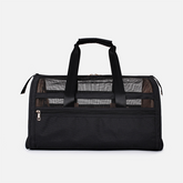 Green Muffy large capacity pet travel bag with mesh windows and adjustable straps for easy carrying.