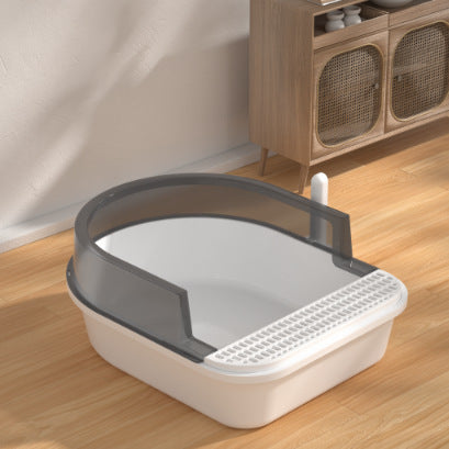 Large semi-enclosed grey cat litter box by Muffy, designed for pets, showing the spacious interior and high sides.