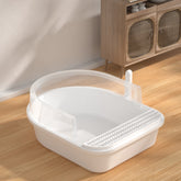 Large grey semi-enclosed cat litter box by Muffy, designed for pets, with high sides and a covered entry for privacy and odor control.