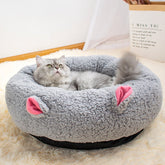 Grey Lamb Wool Round Deep Sleep Pet Cat Litter by Muffy, soft and absorbent litter for cats, shown in a close-up image.