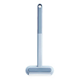 Muffy 4-in-1 pet hair removal brush with multiple tools for removing pet hair from furniture and clothing.