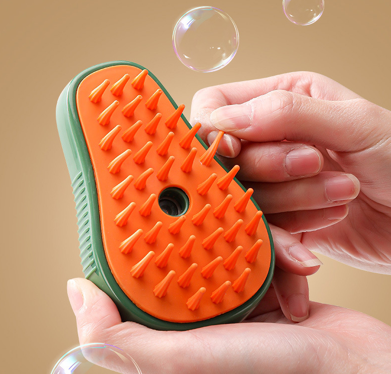 Muffy electric pet brush with spray for cats and dogs, green color, designed to groom and de-shed pets easily