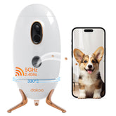 Muffy dog camera with treat dispenser, 2K HD, 4MP, 330° view, black, mounted on a wall with a dog nearby