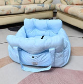 Muffy military green dog car seat bed with soft cushion and secure sides, designed for comfort and safety during car travel.