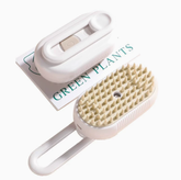 Muffy 3-in-1 electric pet brush in milk brown with interchangeable brush heads for grooming cats and dogs.