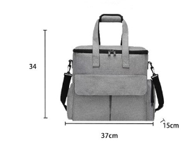 Grey Muffy pet travel bag with breathable mesh sides and sturdy handle for easy carrying and secure transport of small pets.