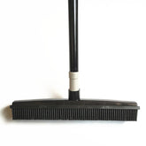 Muffy pet hair removal broom with long handle and rubber brush for effective fur cleaning on furniture and floors.