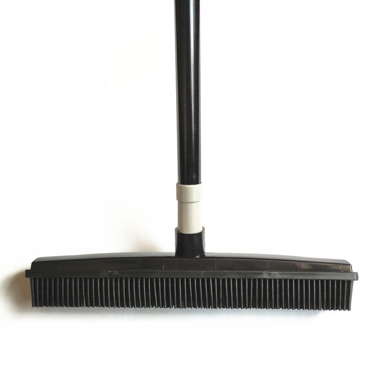 Muffy pet hair removal broom with long handle and rubber brush for effective fur cleaning on furniture and floors.