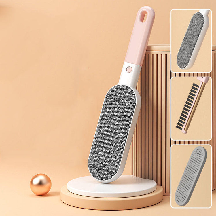 Pink double-sided pet hair removal brush by Muffy for furniture cleaning, featuring textured surfaces to lift pet hair effectively.