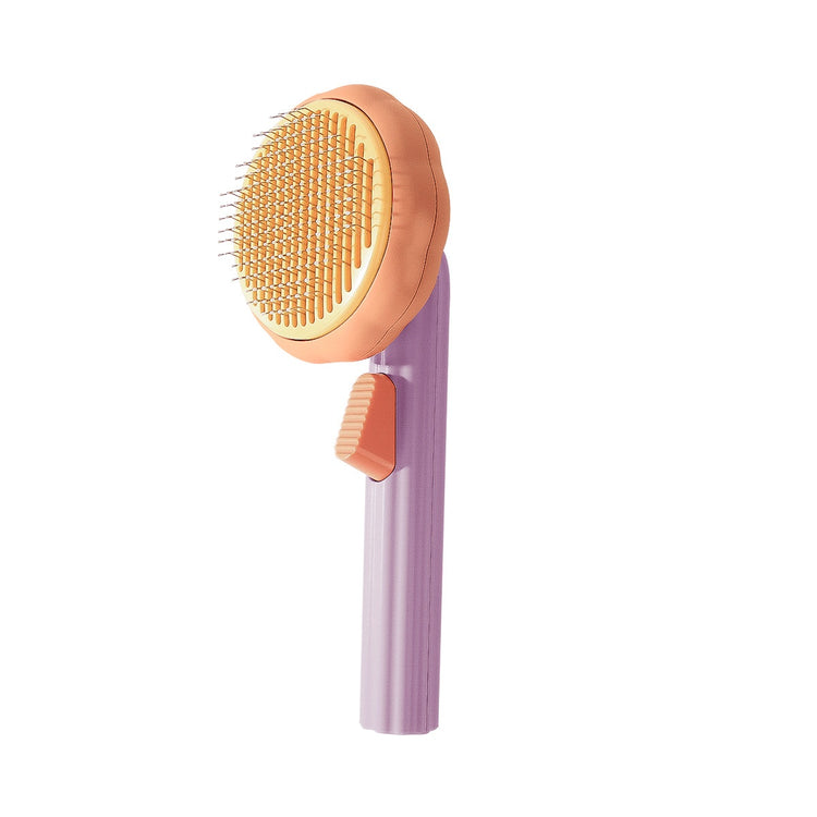 Purple Muffy Pumpkin Pet Grooming Brush with soft bristles for gentle fur detangling and grooming.