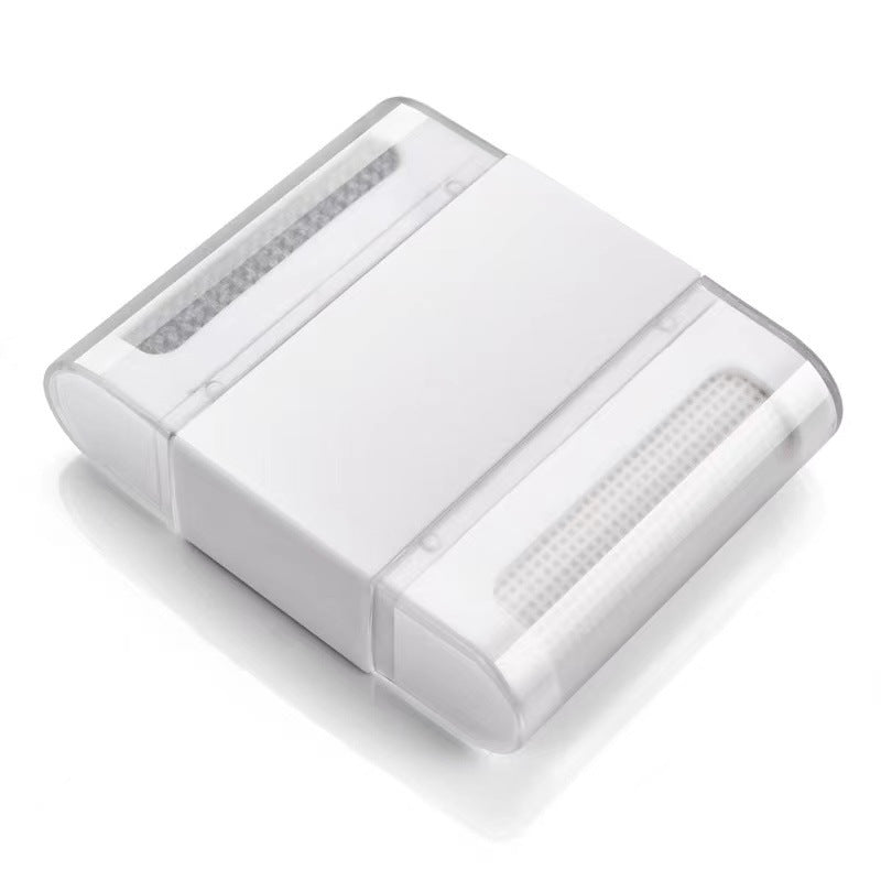 Muffy portable manual fabric shaver in white for pet hair removal, featuring a single head and compact design.