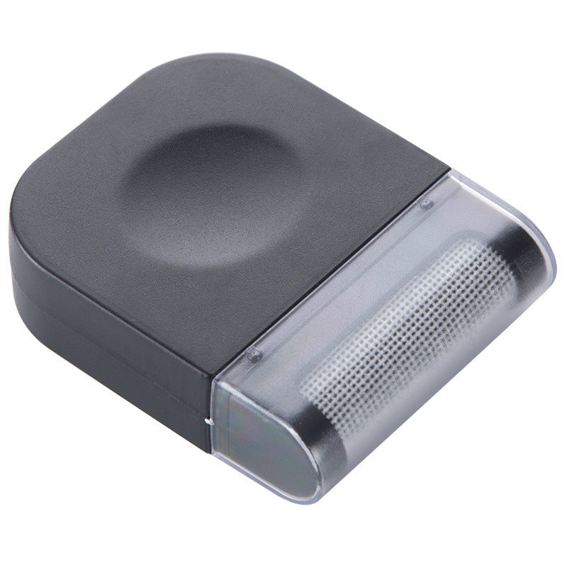 Muffy portable manual fabric shaver in white for pet hair removal, featuring a single-head design for removing lint and fuzz.