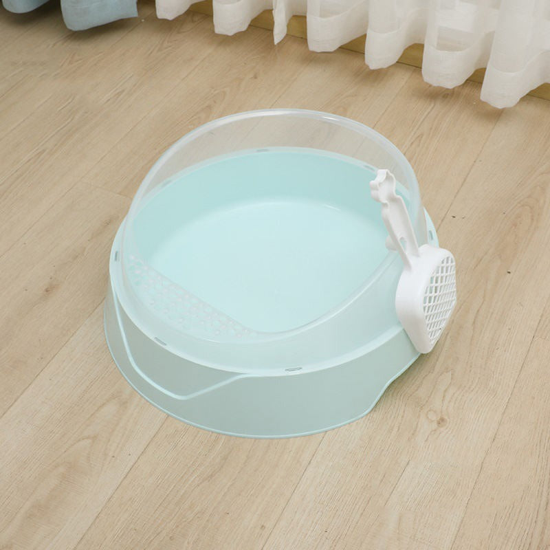 Large semi-enclosed pink cat litter box with matching scoop by Muffy, designed for easy cleaning and privacy.