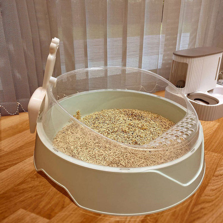 Large semi-enclosed Muffy cat litter box with a matching scoop, made of durable plastic in pink, designed for easy cleaning and privacy.