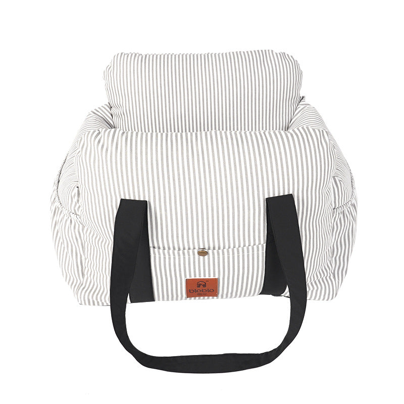 Grey Muffy pet travel dog safety car carrier with striped design, securely fits in car for safe pet transportation.