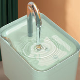 Muffy automatic cat water fountain with white crystal elbow, green cover, USB interface, and anti-dry burning feature for pets