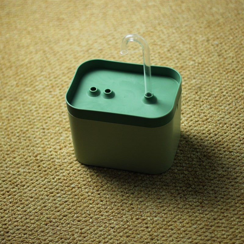 Muffy automatic cat water fountain with USB interface, green cover, white crystal elbow, designed for pet hydration.