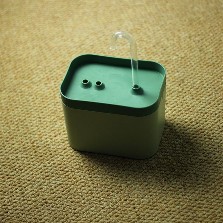 Muffy automatic cat water fountain with USB interface, green cover, white crystal elbow, designed for pet hydration.