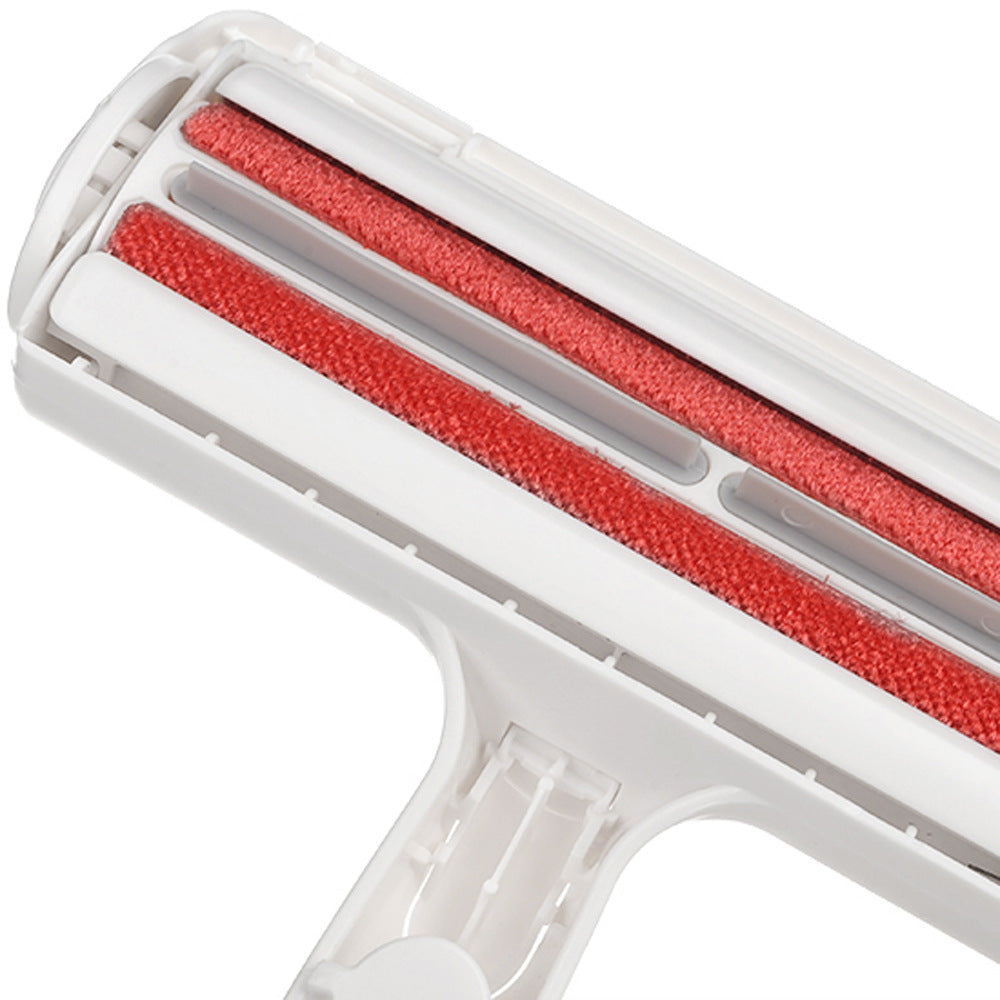 Muffy pet hair removal brush for carpets and furniture, white color, designed to easily remove pet hair from surfaces.