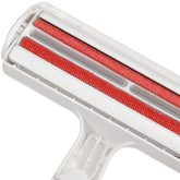 Muffy pet hair removal brush for carpets and furniture, white color, designed to easily remove pet hair from surfaces.