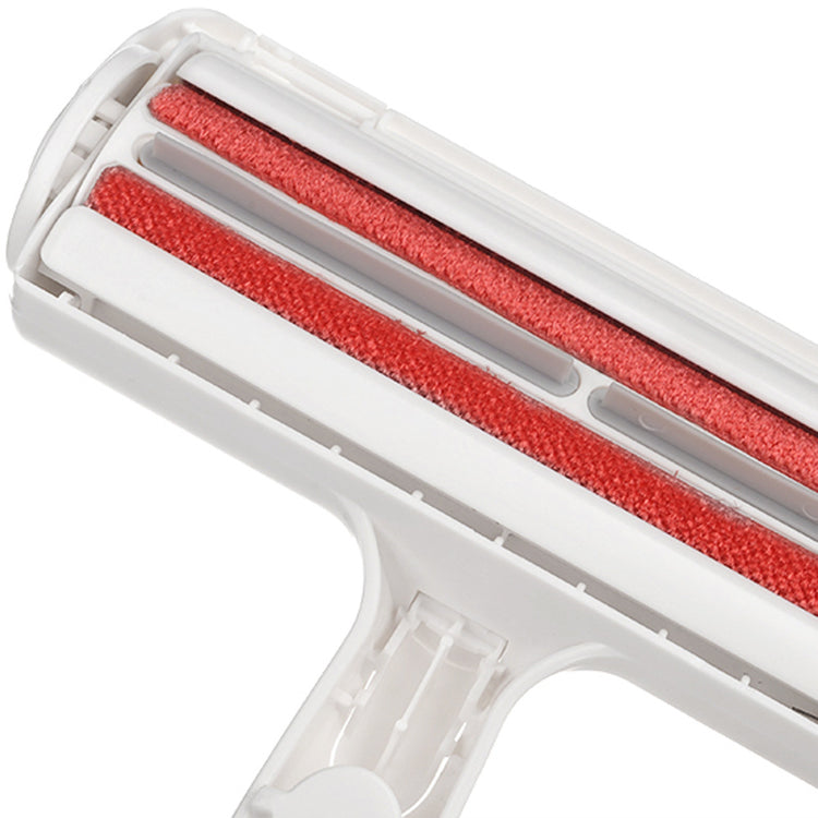 Muffy pet hair removal brush for carpets and furniture, white color, designed to easily remove pet hair from surfaces.