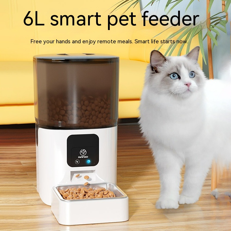 White Muffy 6L automatic pet feeder showing digital control panel and food tray for feeding cats or small dogs.