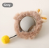 Green Muffy PurrPlay self-rolling cat toy ball with attached rope, designed to entertain and engage cats during playtime.