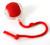 Green Muffy PurrPlay self-rolling cat toy ball with rope, designed to entertain cats with natural rolling motion and playful features.
