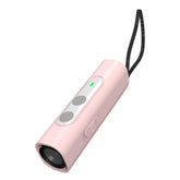 Black Muffy ultrasonic dog repeller with flashlight feature, compact device for humane dog deterrence and outdoor safety.